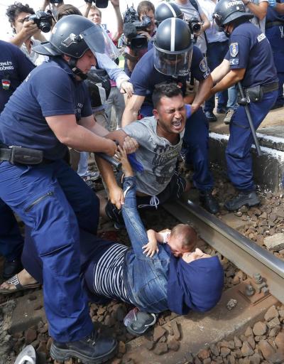 image credit: http://www.nydailynews.com/news/national/refugee-couple-throw-baby-train-tracks-article-1.2347227